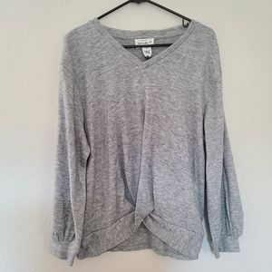 For the republic.  Gray medium sweater
